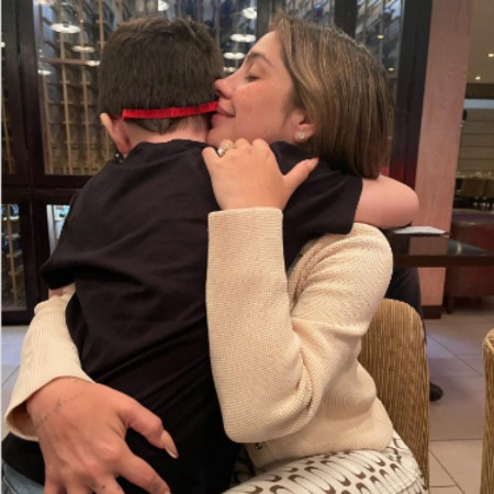 Andrea De Castro Font took a picture of hugging her son.